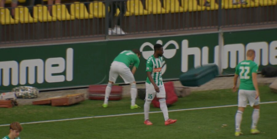 Sign for Čeburinas: Vilnius' 'Žalgiris' players threw bags onto the field before the match at the LFF Stadium.