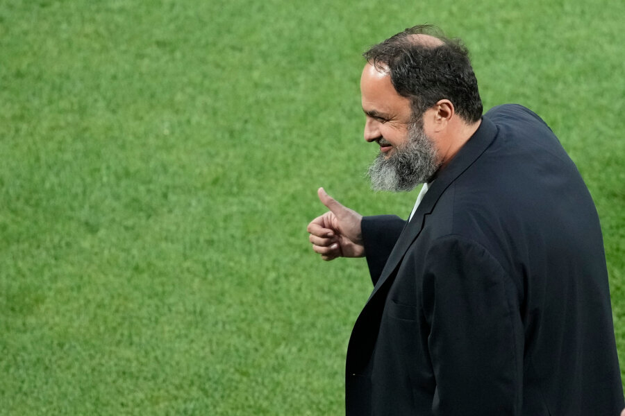 Captured: Euroleague Final Four owner E. Marinakis of Nottingham Forest was struck in the face.