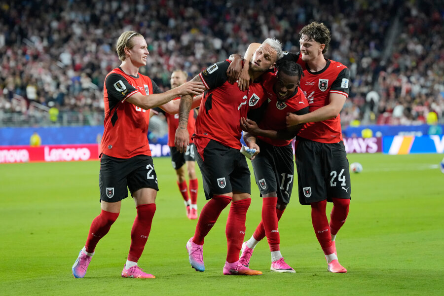 The match between Austria and Algeria ended in a high-scoring draw.